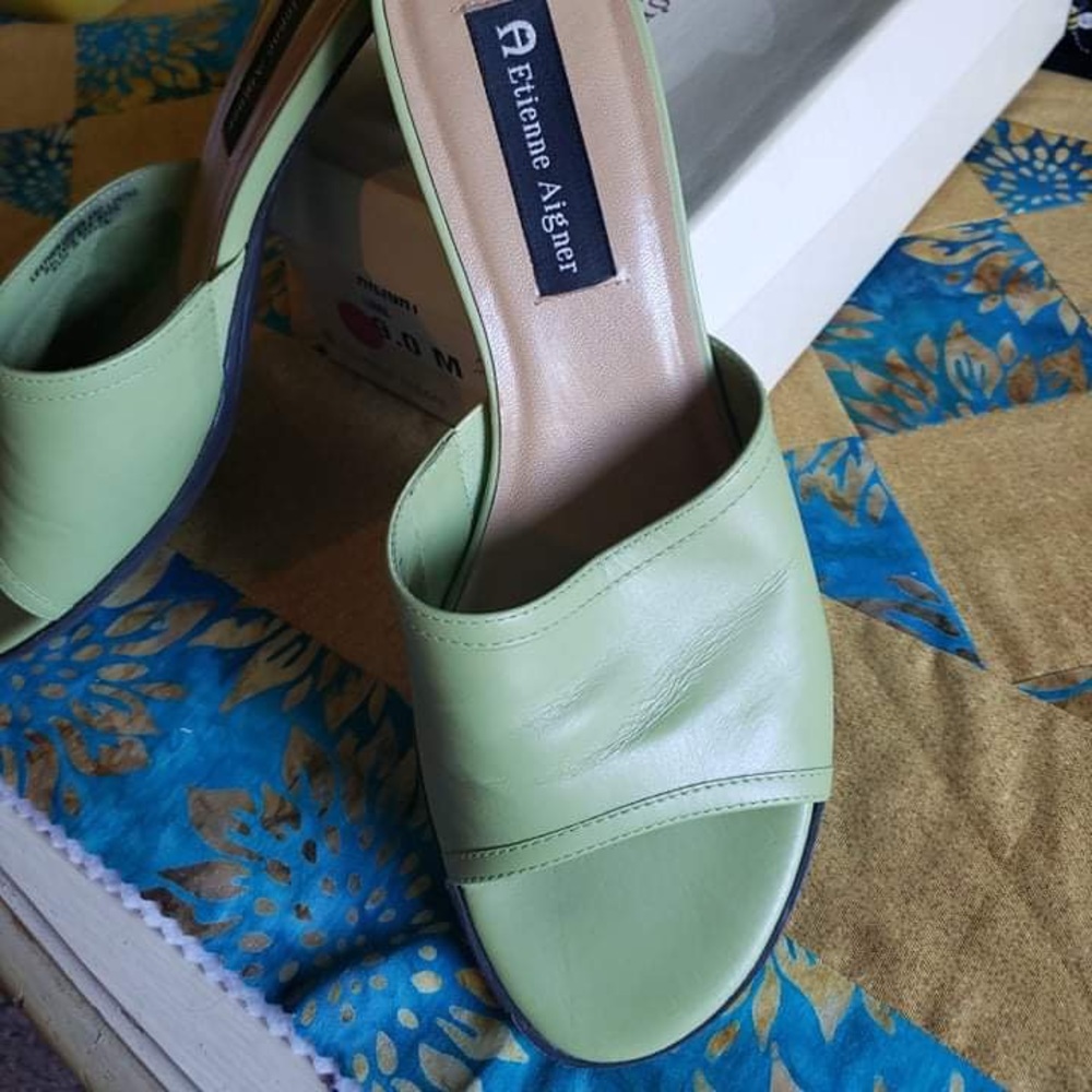Light green/mint leather heeled slides.